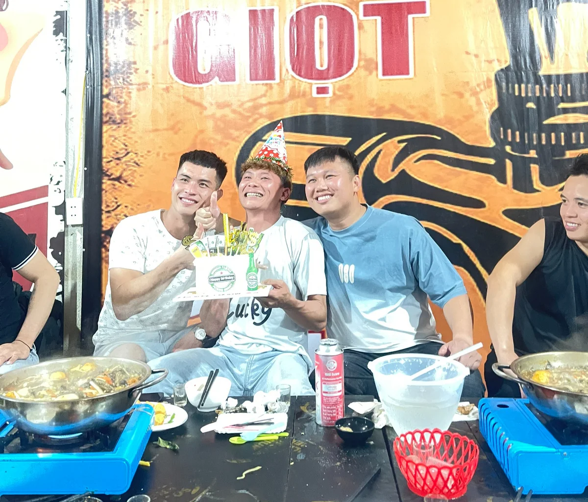 Local drivers celebrating a birthday on the Ha Giang Loop