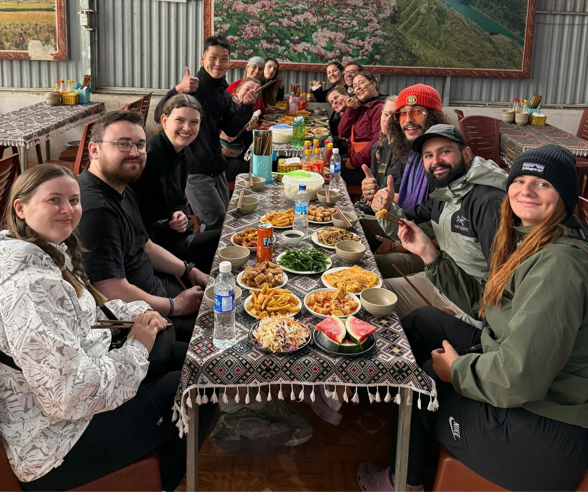 Guests enjoying family dinner on the Cao Bang Loop