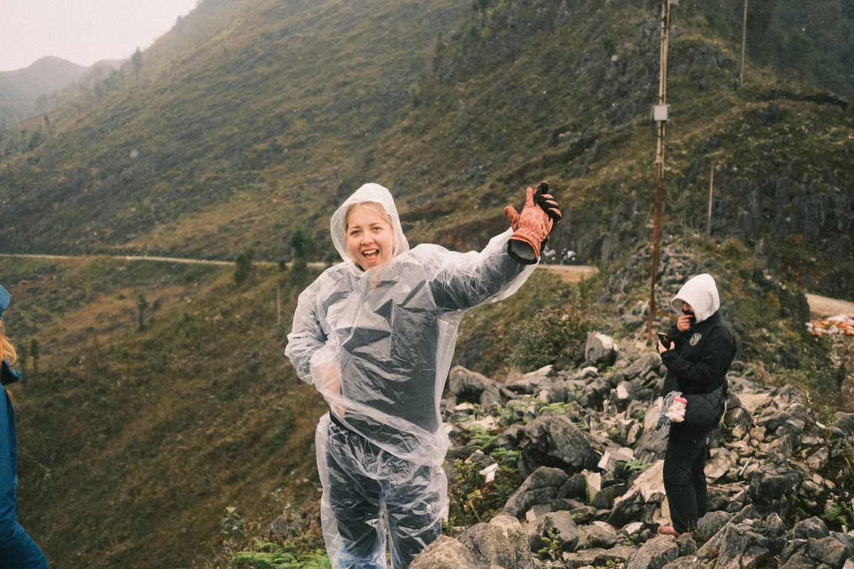 Girl smiles at the camera after completing a hike on the Ha Giang Loop
