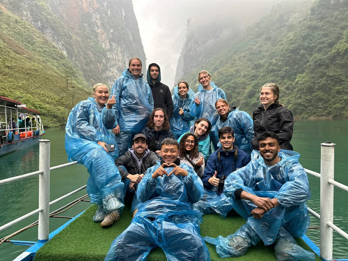 A Bong Hostel group tour wearing rain ponchos
