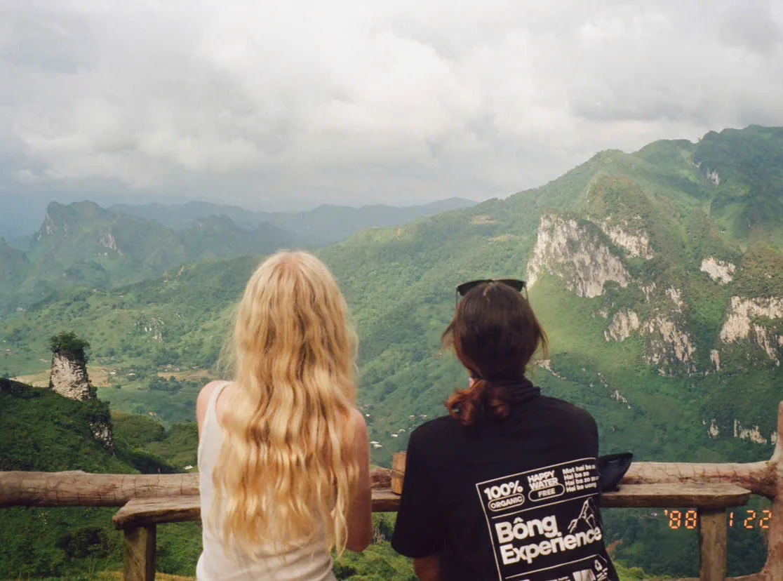 Two girls at a viewpoint on the Ha Giang Loop