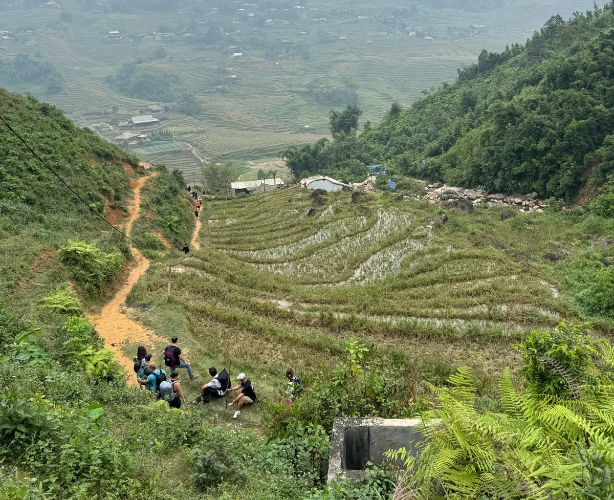 Guests trekking in Sapa with Bong Hostel enjoy a rest