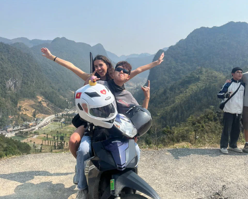 Leader Va and his passenger on the Ha Giang Loop