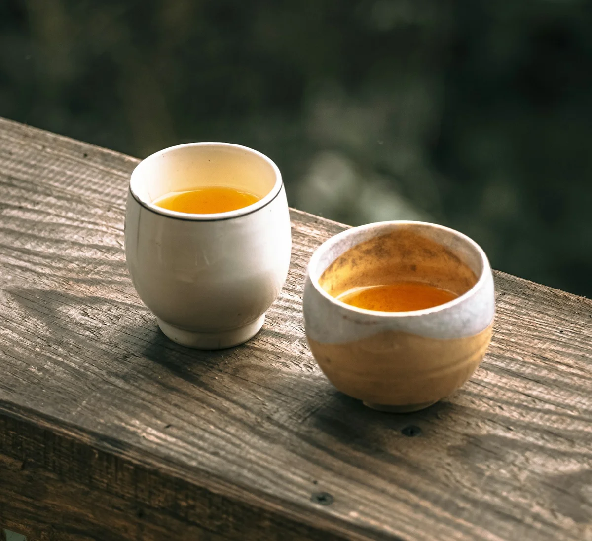 Two cups of tea on a counter in Ha Giang