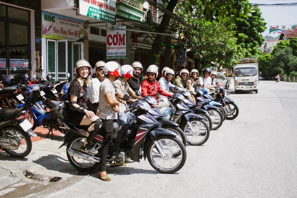 Motorbikes heading off from Bong Hostel to the Ha Giang Loop