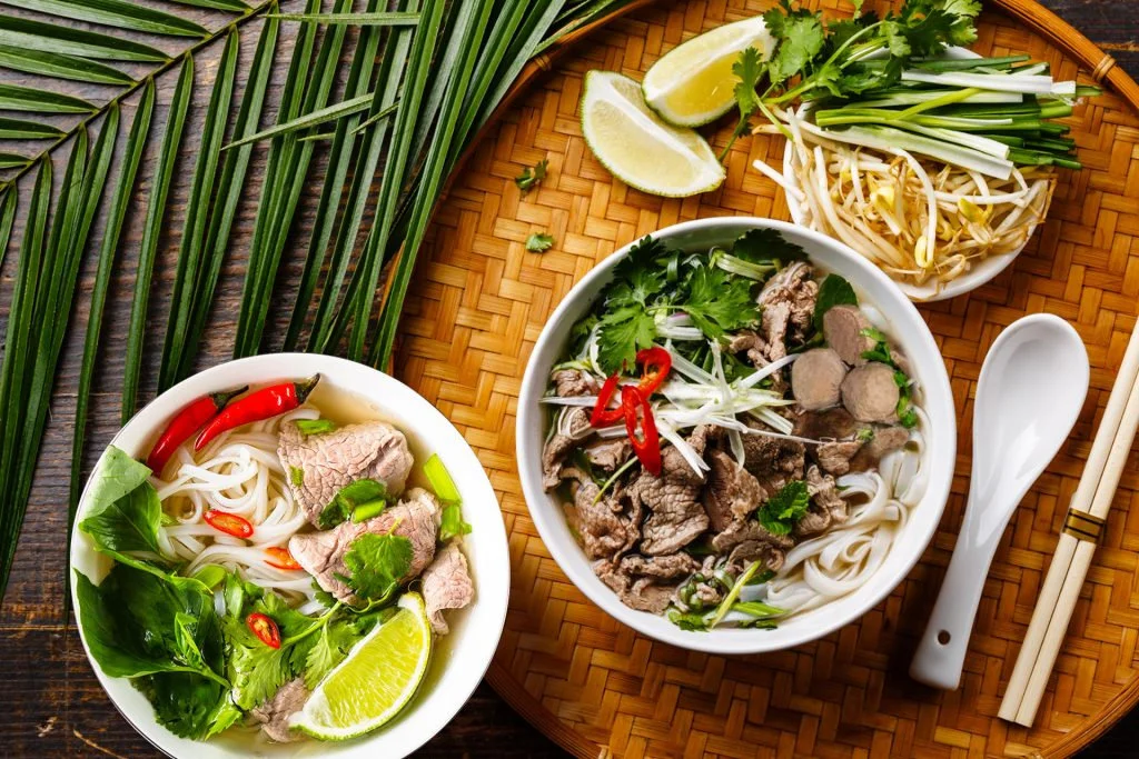 try local dishes like pho