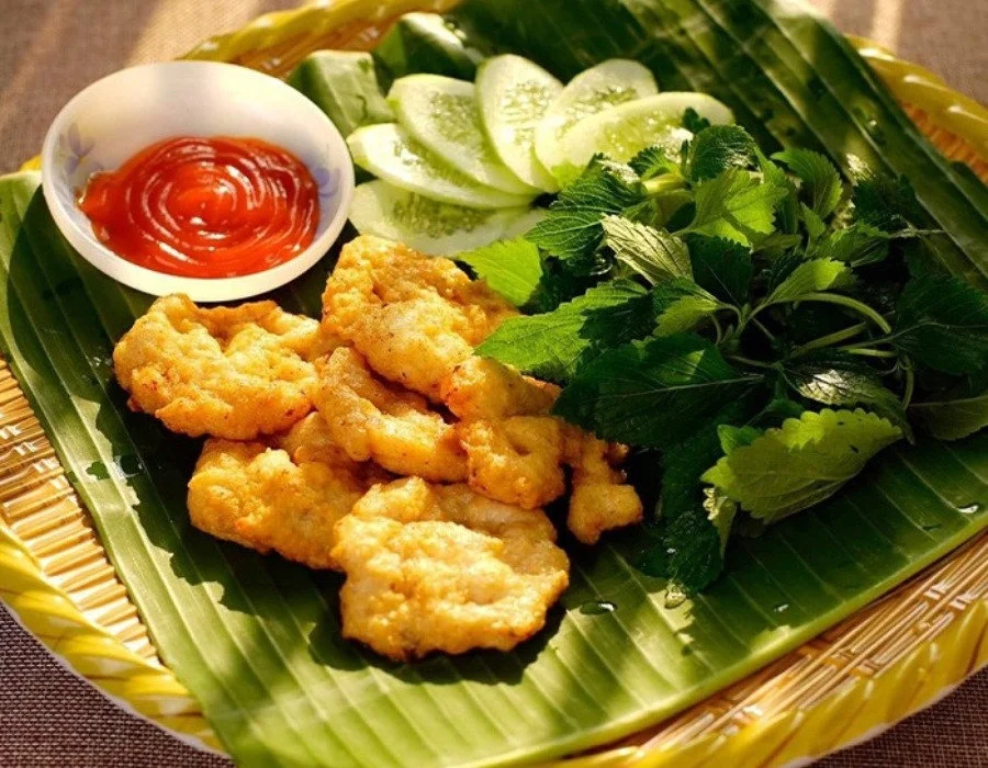 Try a local dish, Chả Mực, in North Vietnam