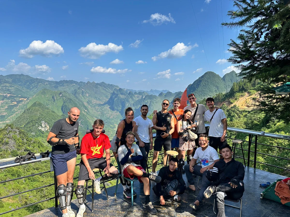 Bong Hostel Group Tour posing in the mountains