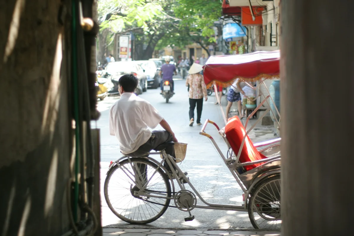 Man sitting on a cyclo in Hanoi