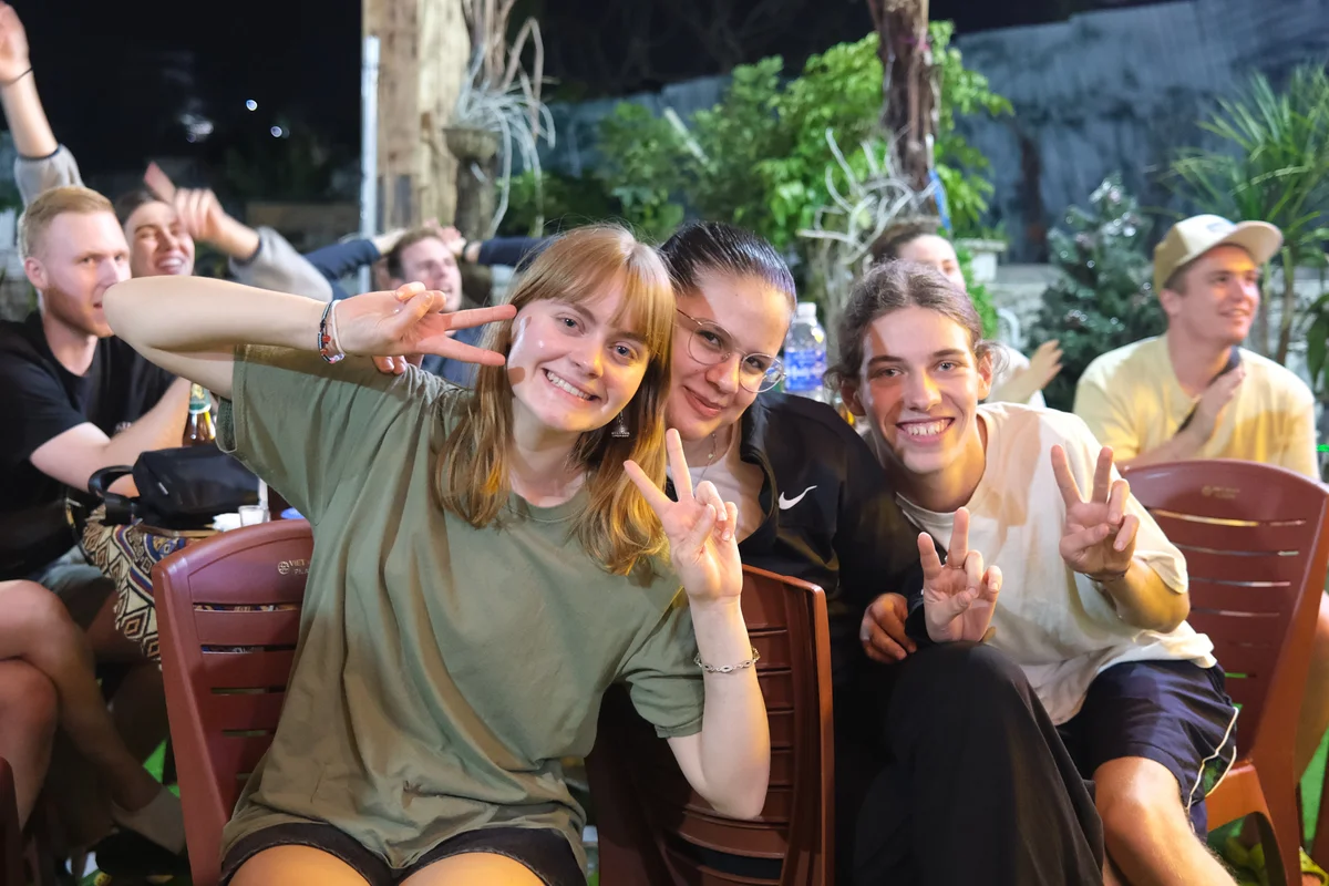Three Bong Hostel guests pose for a photo