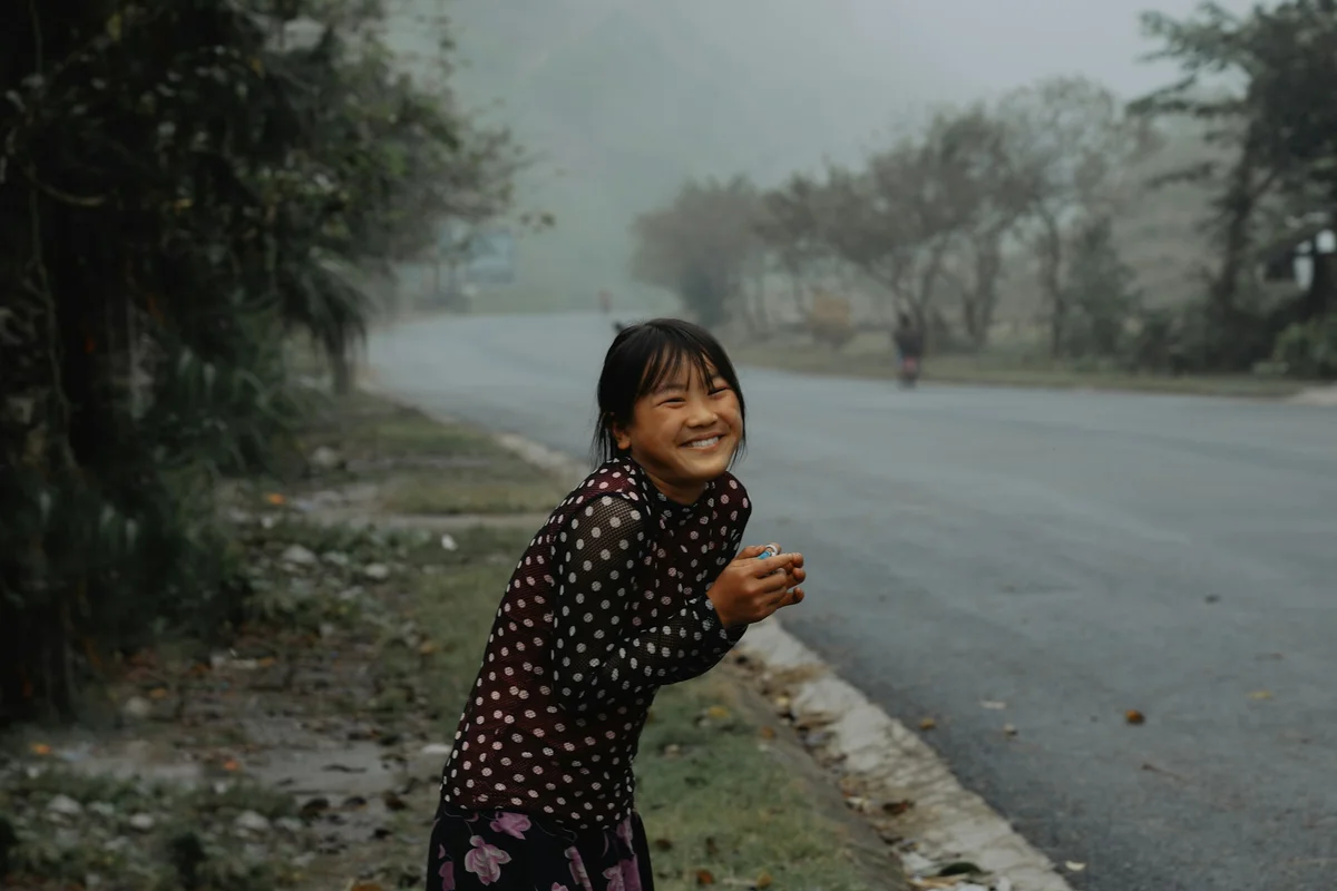 Child smiling in Ha Giang, Vietnam