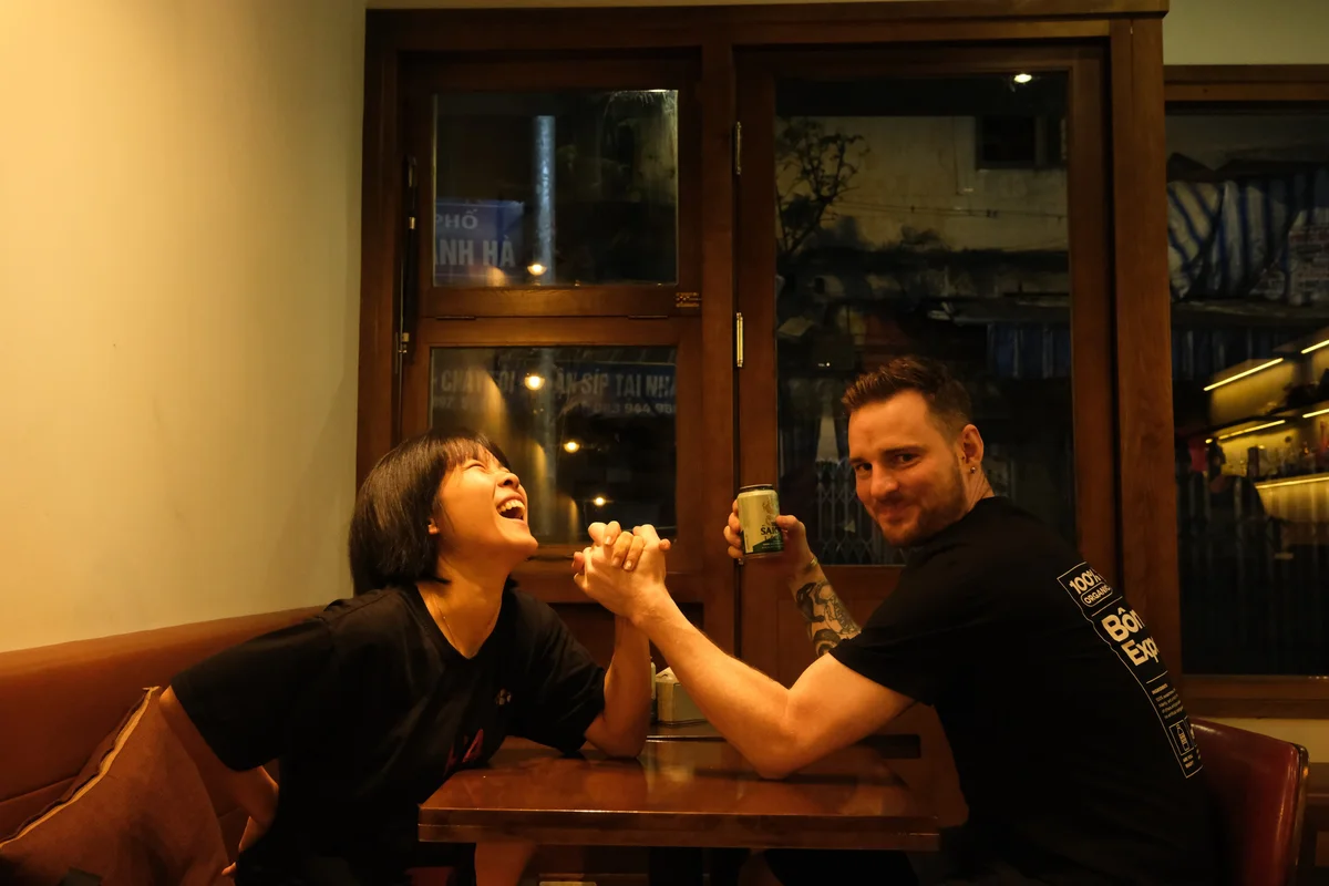 Guests playing at Bong Hanoi Hostel