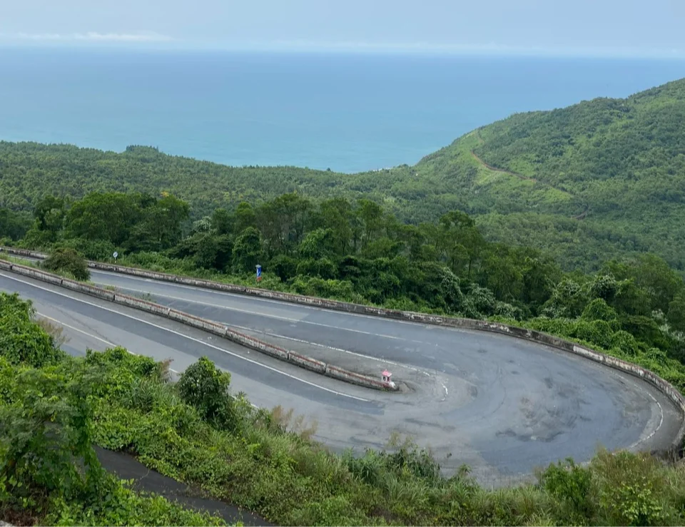Tight road with ocean view beyond