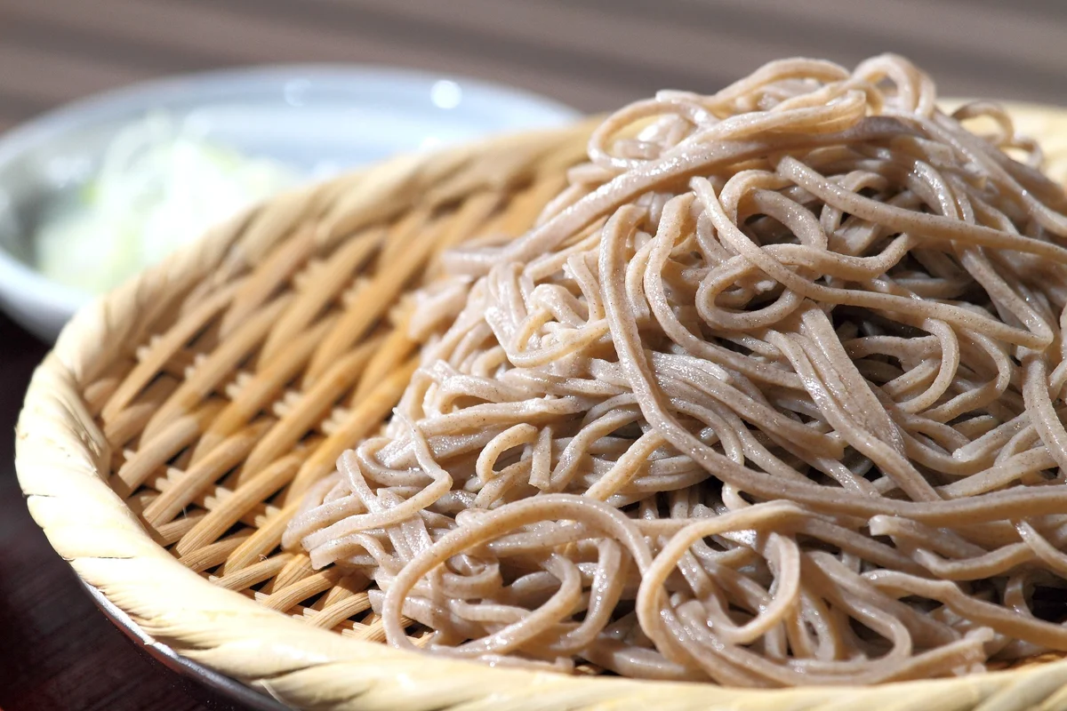 Noodles with a pink colour on a plate