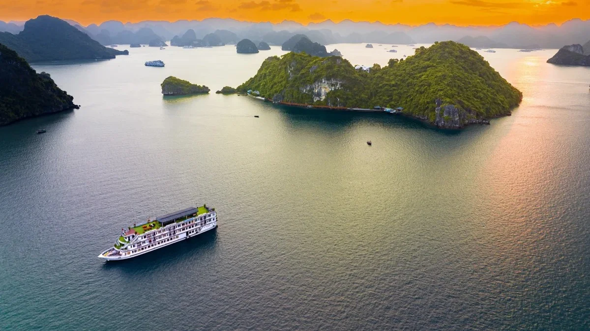 Day 5: HANOI – HALONG BAY – SUPPRISING CAVE  – TITOP ISLAND